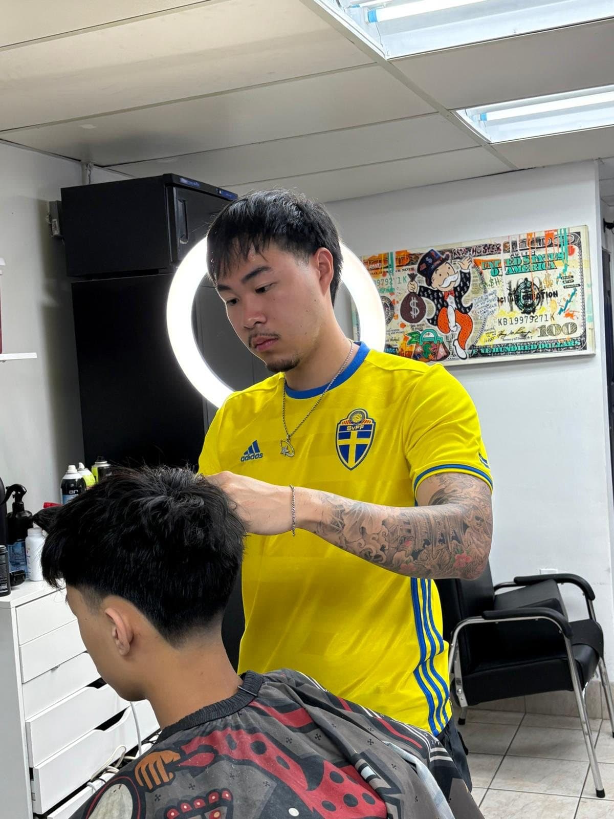 Andrew L., barber at OutKasts Barbershop